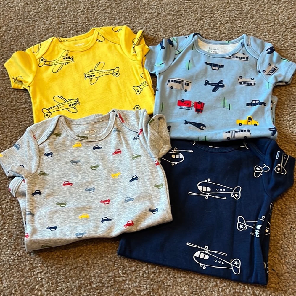 Carter’s Brand New without tag Cars/Tricks/Planes onesie set.  12 month.